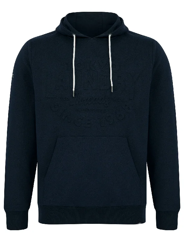 Tides Embossed Motif Brushback Fleece Pullover Hoodie in Sky Captain Navy - Tokyo Laundry